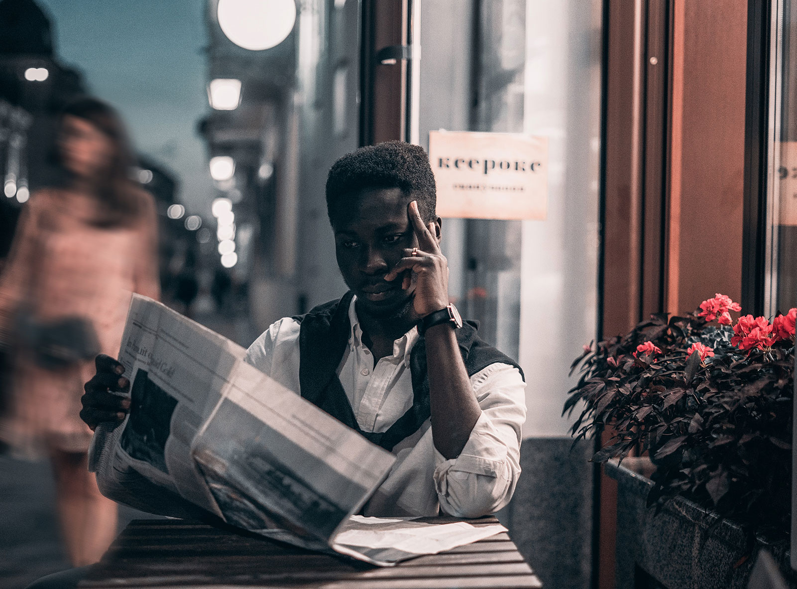 man reading a newspaper