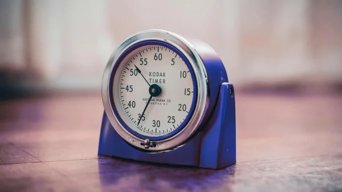 a timer clock sitting on a desk