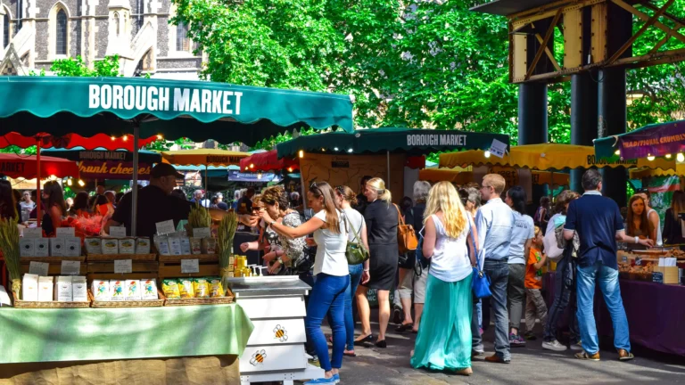 a busy outdoor market on a sunny day