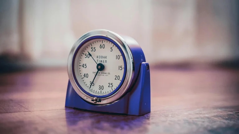 a timer clock sitting on a desk